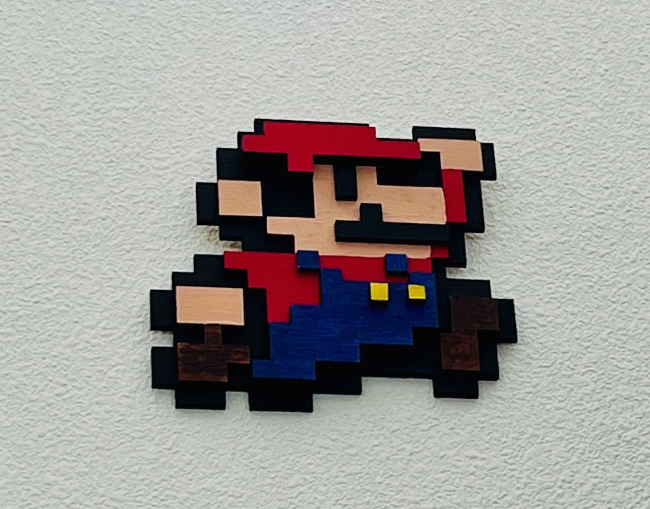 Mario hanging on the wall